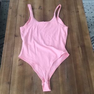 The Garage pink bodysuit